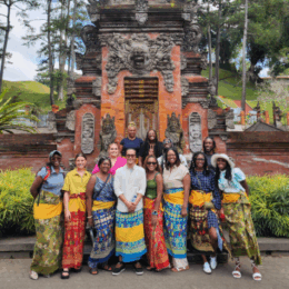 Counseling students standing in front of Tirta Empul Temple in Bali