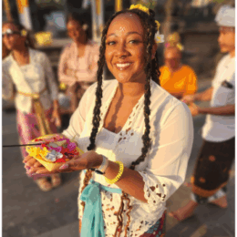 Female student at Uluwatu Temple in Bali.