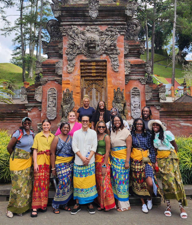 Counseling students standing in front of Tirta Empul Temple in Bali